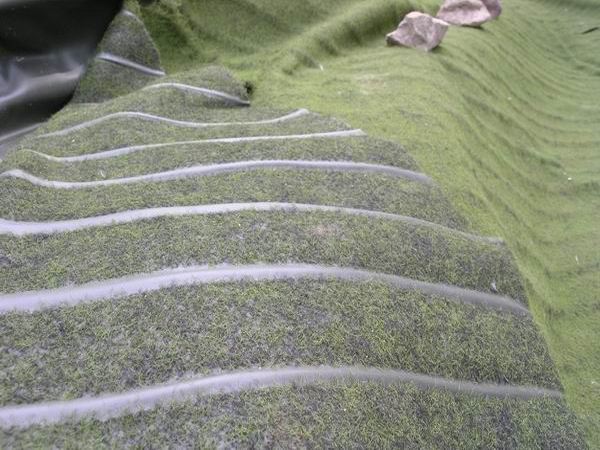 NaturaGart Verbundmatte als Schutz über der Teichfolie